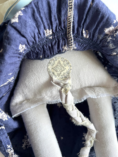 back detail of cat doll.